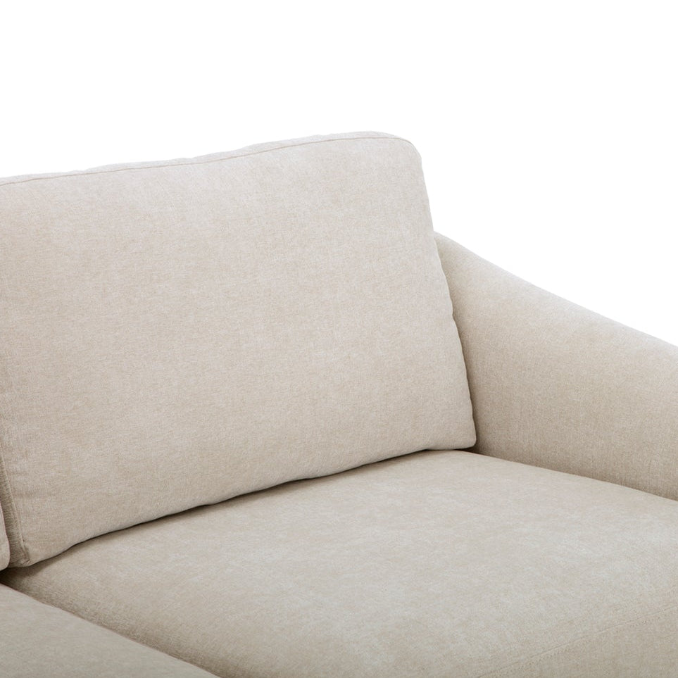Beige sofa on a white background