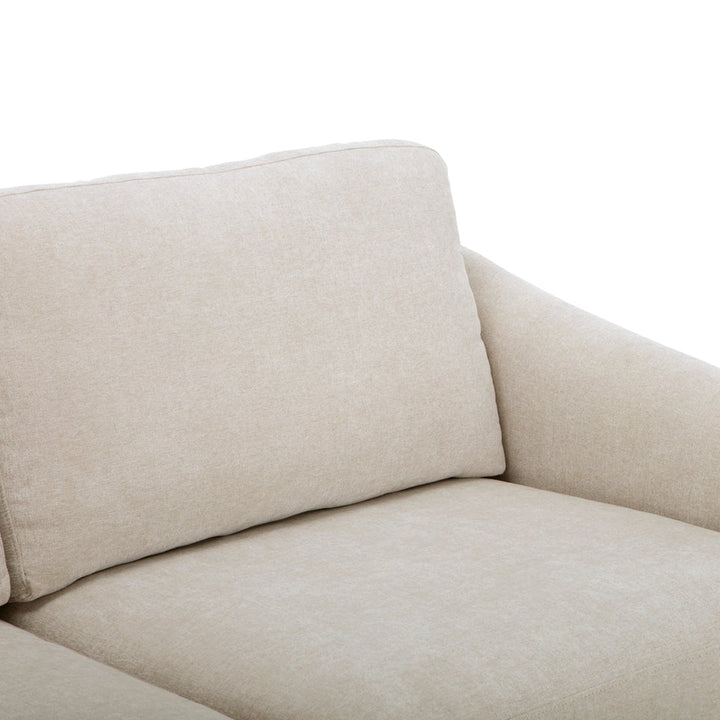 Beige sofa on a white background