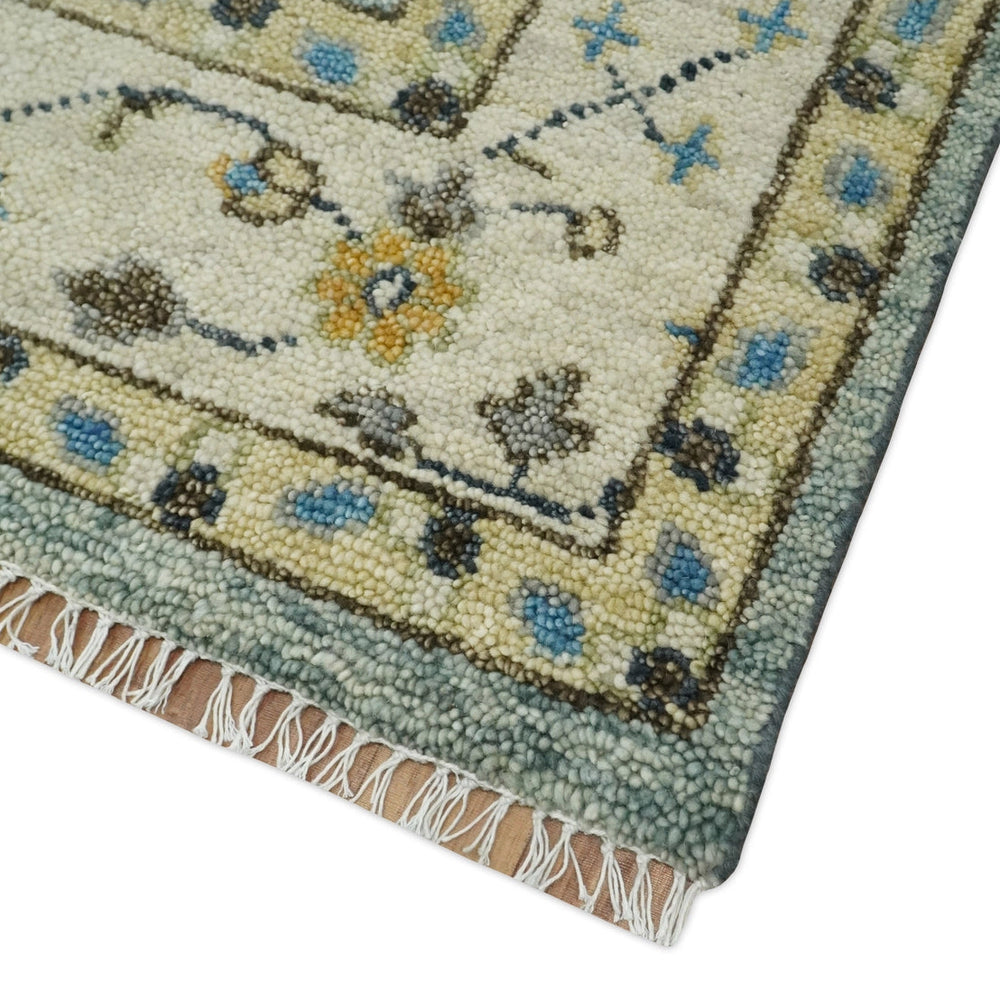 Close-up of a patterned rug with floral designs on a white background