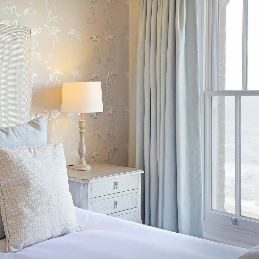 Nakuru Flamingo Wallpaper in Taupe by Juliet Traveres